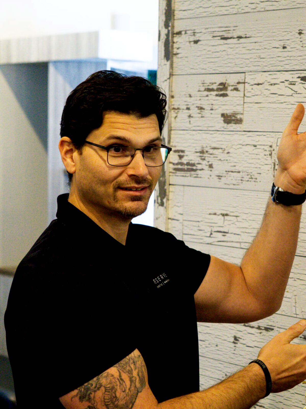 Dr. Ron Martin explaining a spinal segment on an anatomical model